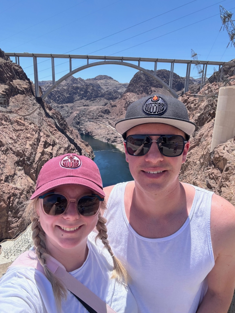 Isabelle (Edmonton Office) and husband, Travis, representing the Oilers at the Hoover Dam (part of their Vegas honeymoon).